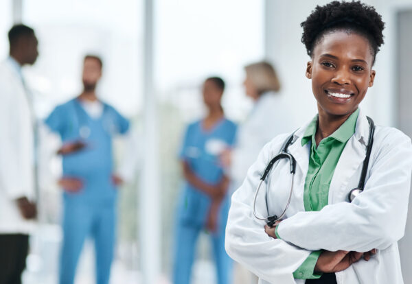 smiling-doctor-in-medical-practice-enjoying-specialised-banking-services